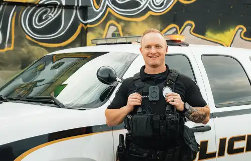 Officer in front of Vehicle